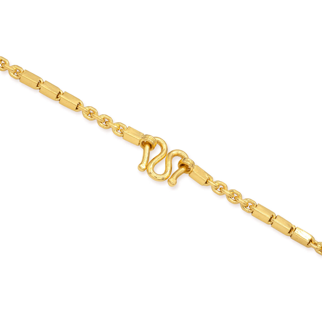 M clasp on a gold bar link anchor chain on a white background