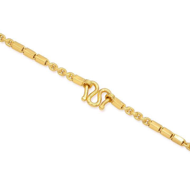 M clasp on a gold bar link anchor chain on a white background