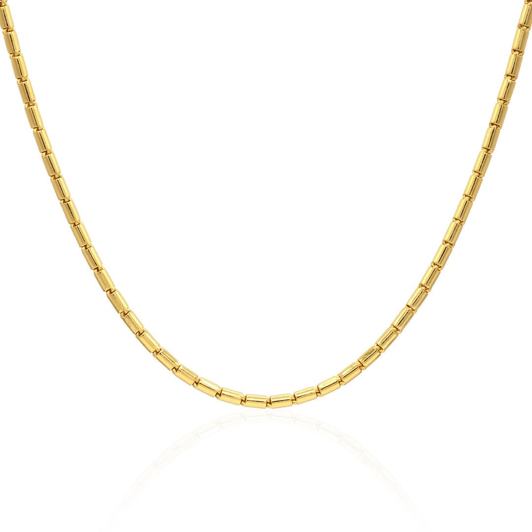 24k gold barrel baht chain on a white background