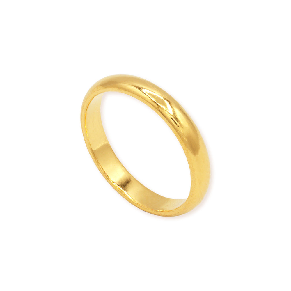3mm 24k gold domed wedding band standing upright showing profile