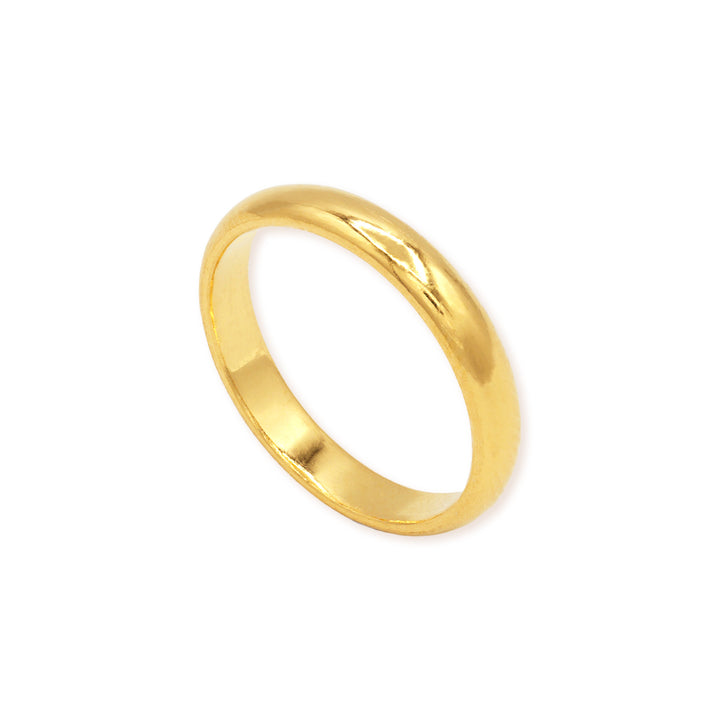 3mm 24k gold domed wedding band standing upright showing profile
