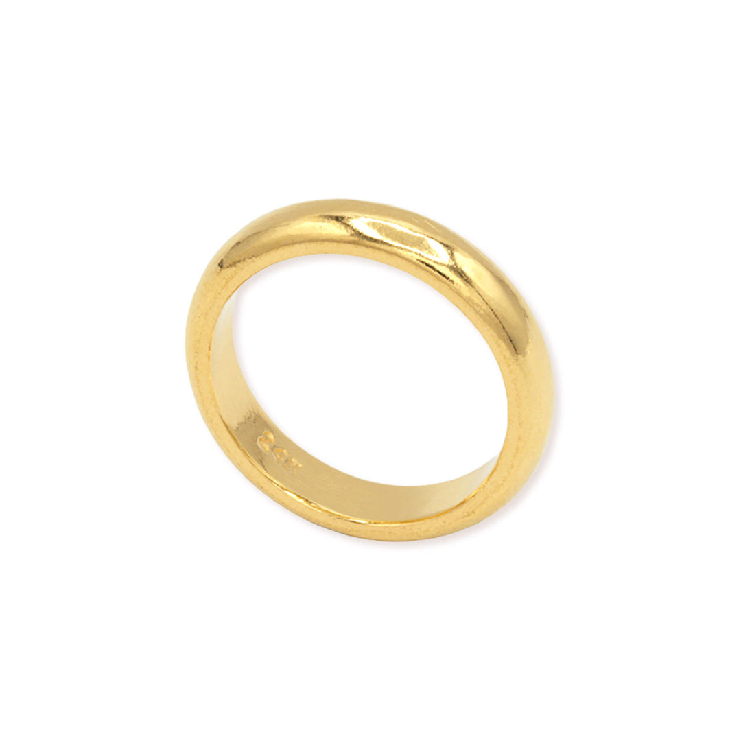 Standing profile of 4mm 24K gold wedding band showing width and dome shape