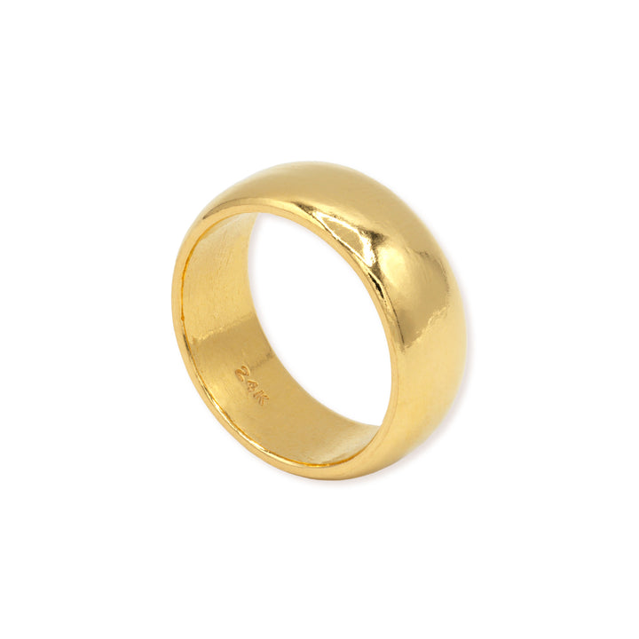 Standing view of 8mm 24k gold men wedding band on a white background