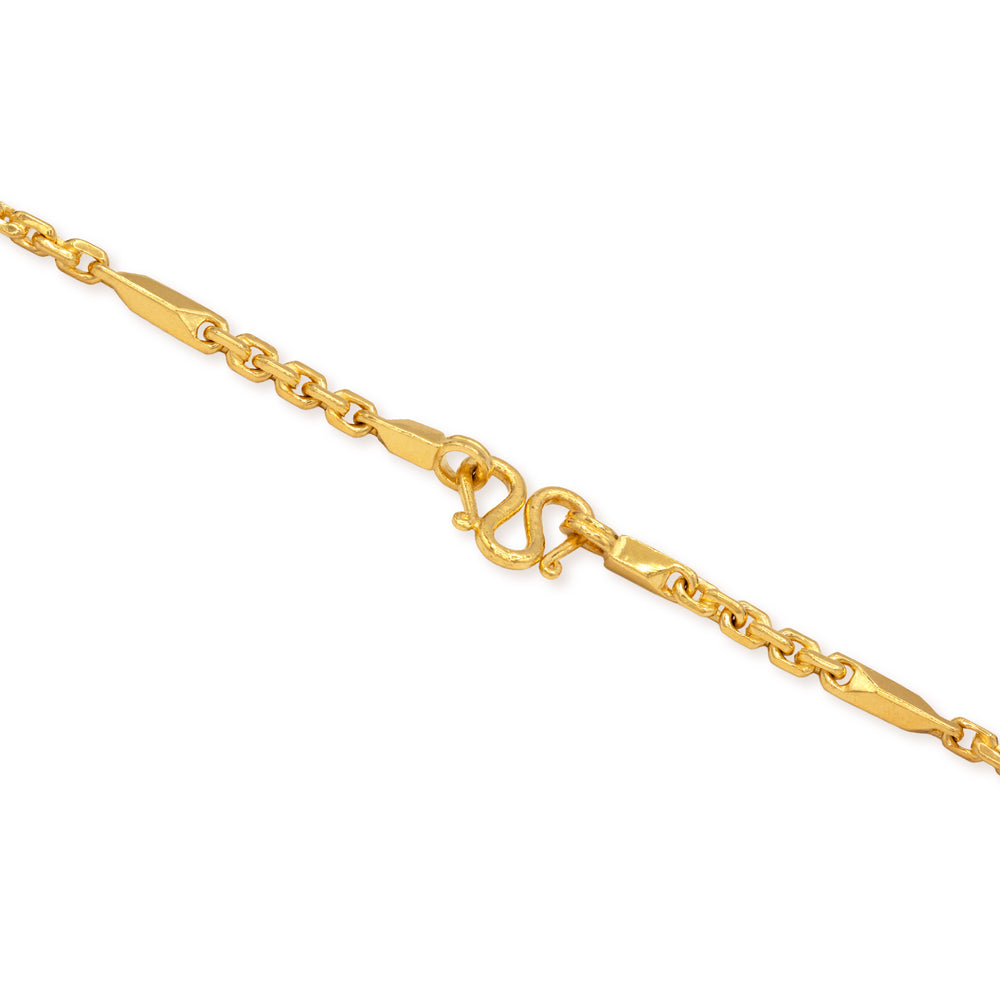 Close-up of secure M lock clasp on 24k gold fancy link chain necklace