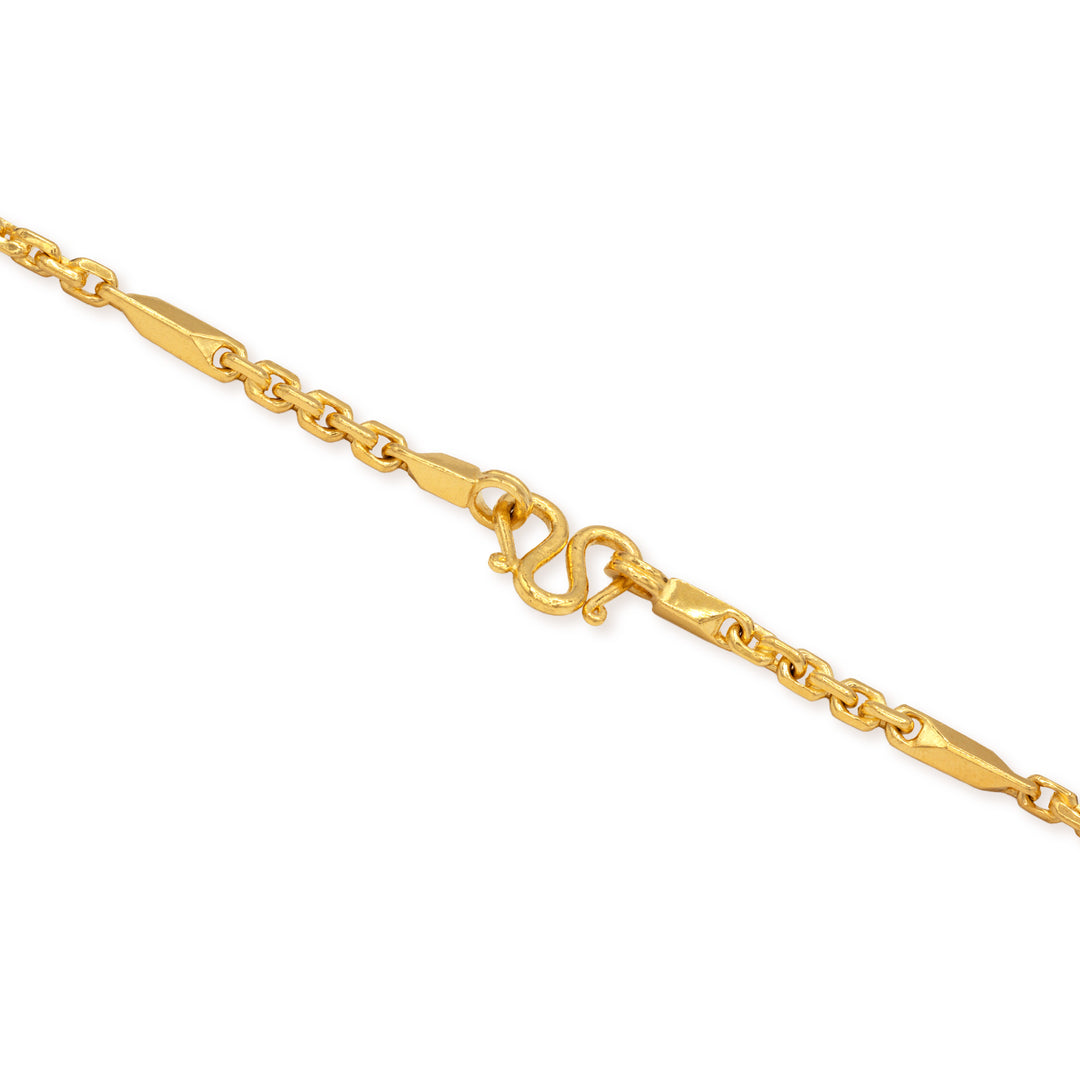 Close-up of secure M lock clasp on 24k gold fancy link chain necklace