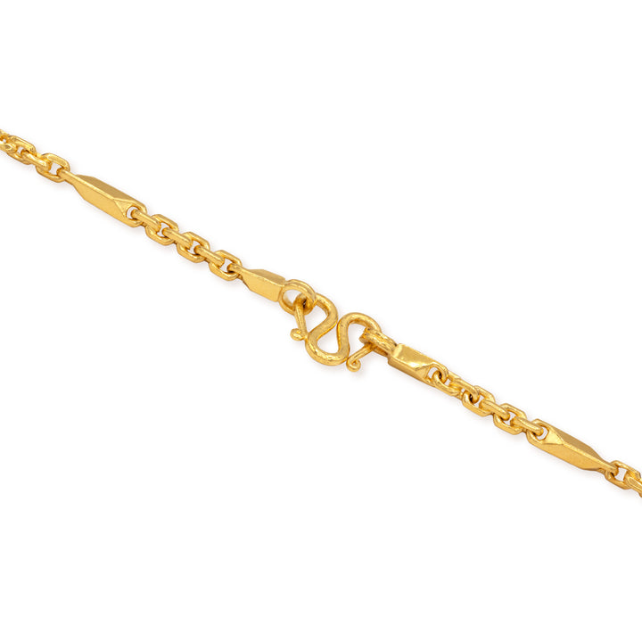 Close-up of secure M lock clasp on 24k gold fancy link chain necklace