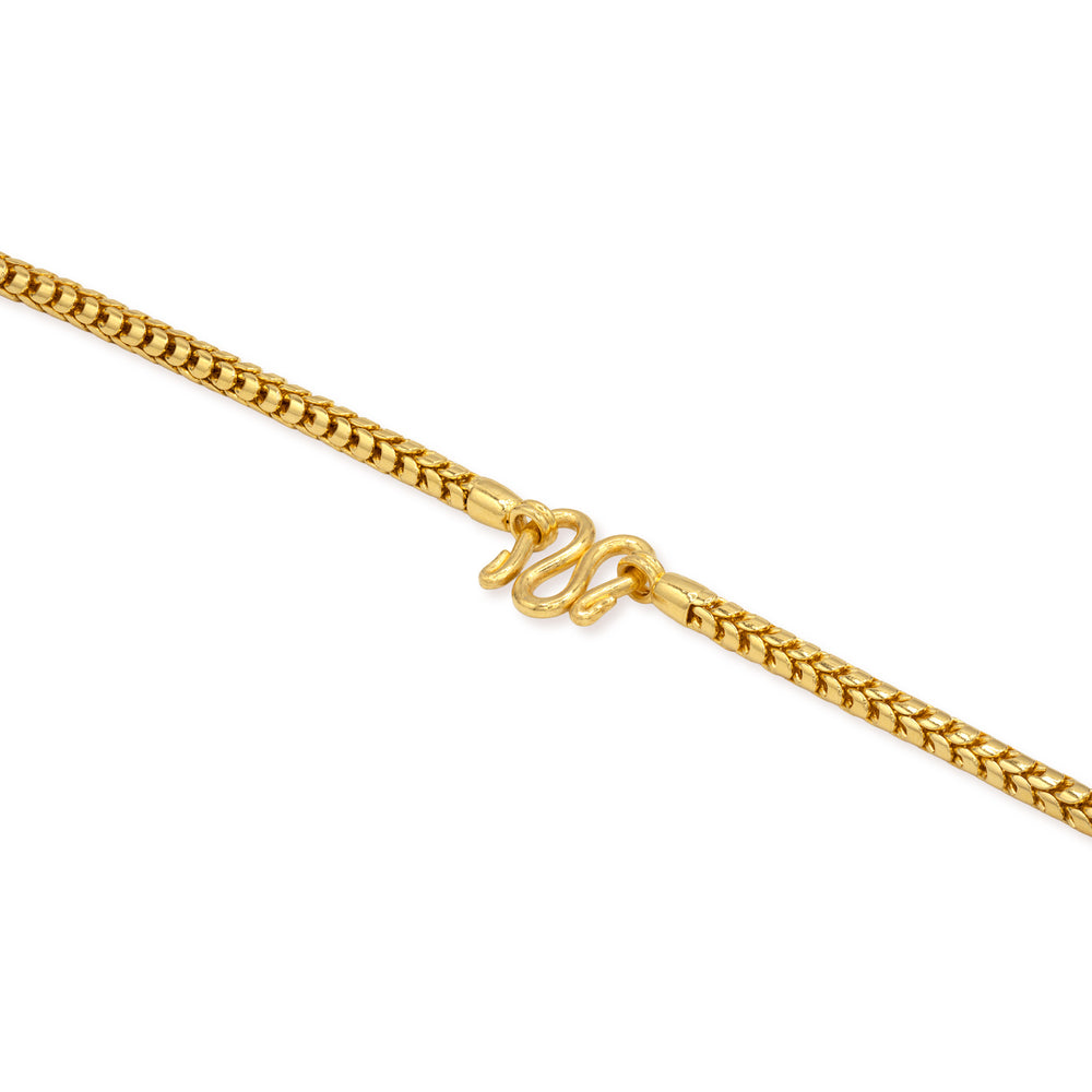 Close-up of secure M lock clasp on 24k gold Franco chain necklace
