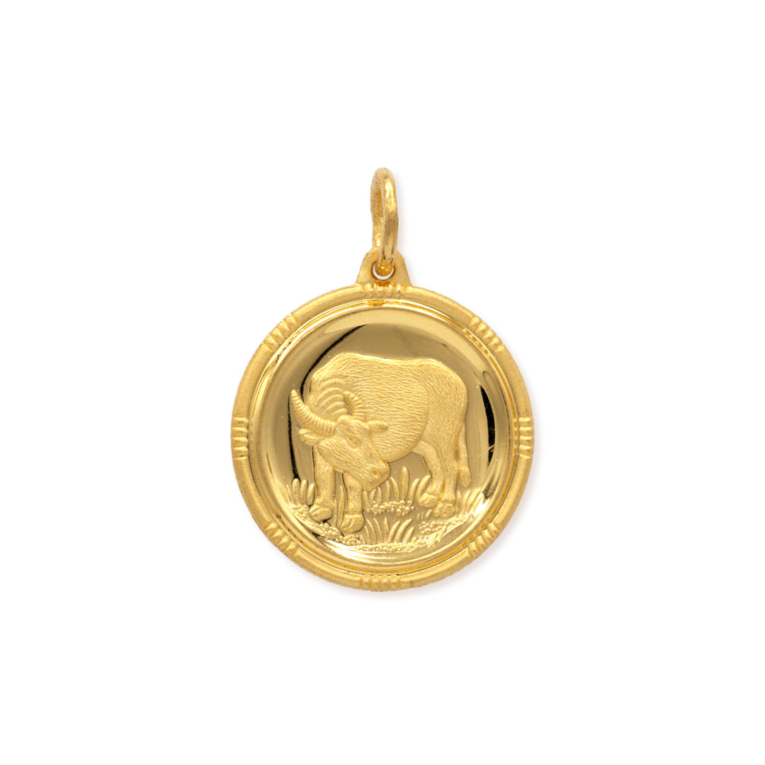 24k gold Chinese zodiac ox pendant with detailed cast relief design