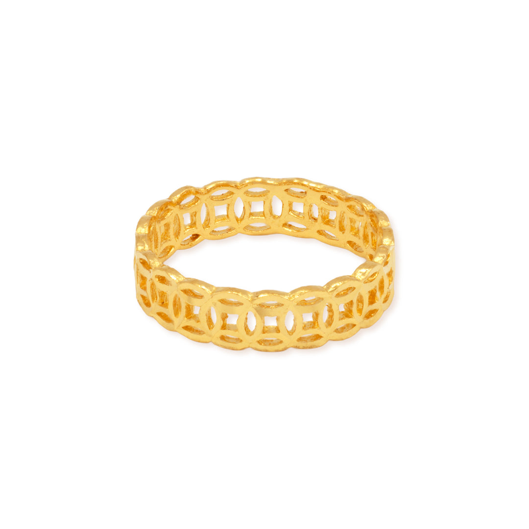 24k gold money maker ring laying flat on a white bacground