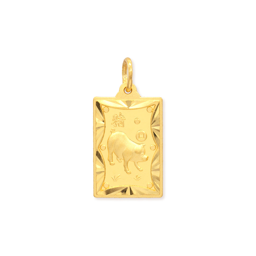 front of 24k gold pig zodiac pendant on white background