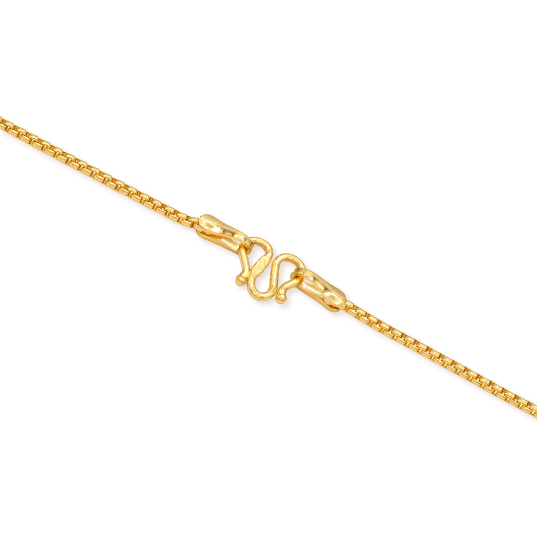 Close-up of an m clasp attached to a round box chain in white background